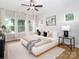 Bright primary bedroom featuring large windows and comfortable furniture at 2507 Elon St, Charlotte, NC 28208