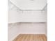 Spacious walk-in closet with ample shelving and modern laminate flooring at 2507 Elon St, Charlotte, NC 28208