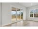Spacious living area with sliding glass doors leading to an outdoor deck at 3025 Tramore Dr, Harrisburg, NC 28075