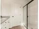 Bathroom featuring a walk-in shower with a sleek black frame and granite countertops at 3338 Strong Box Ln, Gastonia, NC 28052
