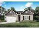 Charming single Gathering home featuring a two-car garage, landscaped front yard and a classic, inviting facade at 3338 Strong Box Ln, Gastonia, NC 28052