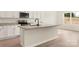 Bright, modern kitchen with granite countertops, white cabinets and stainless steel appliances, and breakfast bar seating at 3338 Strong Box Ln, Gastonia, NC 28052