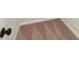 Staircase runner with a textured, earth-toned carpet and modern black door hardware at 3338 Strong Box Ln, Gastonia, NC 28052