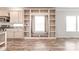 Kitchen cabinets, window seating, and open shelving offer generous storage and natural light at 3648 Plainfield Dr, Shelby, NC 28150