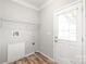 Bright laundry room with drop in sink, washer/dryer hookups, and outdoor access at 3648 Plainfield Dr, Shelby, NC 28150