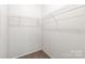 A bright and spacious walk-in closet features wire shelving and neutral walls at 3648 Plainfield Dr, Shelby, NC 28150