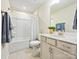 Neutral bathroom featuring a tub/shower combo, vanity with storage, and modern fixtures at 3813 Amalia Pl, Indian Land, SC 29707