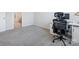 Comfortable bedroom with office desk and chair with a neutral color scheme at 3813 Amalia Pl, Indian Land, SC 29707