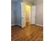 Bedroom with laminate floors and closet doors at 415 S Broad St, Gastonia, NC 28052