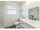 Stylish bathroom with a marble-tiled shower, modern vanity, and elegant fixtures, offering a luxurious and functional design at 4336 Valeview Ln, Charlotte, NC 28269