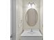Well-lit bathroom featuring a large mirror, and a white vanity at 4418 Coventry Row Ct, Charlotte, NC 28270