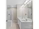 Bathroom with a double sink vanity, and a glass-enclosed shower at 4418 Coventry Row Ct, Charlotte, NC 28270