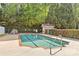 Community pool with well-maintained surrounding fence and equipment shed at 4418 Coventry Row Ct, Charlotte, NC 28270