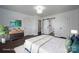 This spacious bedroom has hardwood floors and easy access to the bathroom via sliding barn door at 4979 Plateau Rd, Vale, NC 28168