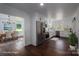 Open kitchen with modern appliances, stainless steel refrigerator, and white cabinets at 4979 Plateau Rd, Vale, NC 28168