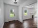 Inviting living area showcasing hardwood floors, a fireplace, and ample natural light at 4979 Plateau Rd, Vale, NC 28168