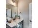 Stylish half-bathroom features modern vanity with framed mirror, soft lighting, and neutral walls at 5380 Pembrey Dr # Lot 26, Denver, NC 28037