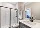 Modern bathroom with glass-enclosed shower, sleek vanity, and contemporary fixtures at 5380 Pembrey Dr # Lot 26, Denver, NC 28037