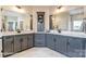 Primary bathroom with double vanity, marble floors, dual mirrors, and recessed lighting at 5380 Pembrey Dr # Lot 26, Denver, NC 28037