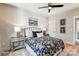 Bedroom features a ceiling fan, neutral walls, carpet and well-lit windows at 5380 Pembrey Dr # Lot 26, Denver, NC 28037