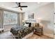 Relaxing bedroom features a ceiling fan, large window, and neutral color palette at 5380 Pembrey Dr # Lot 26, Denver, NC 28037