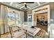 Well-lit office with coffered ceiling and views of the neighborhood, leading into dining area at 5380 Pembrey Dr # Lot 26, Denver, NC 28037