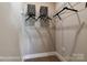 Spacious walk-in closet equipped with shelving, hangers, and ample storage space at 5380 Pembrey Dr # Lot 26, Denver, NC 28037