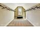 Large walk-in closet featuring carpet, a bench and window with natural light, perfect for organization and storage at 5380 Pembrey Dr # Lot 26, Denver, NC 28037