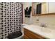 Bathroom featuring a toilet, vanity, and shower at 5623 Eastbrook Rd, Charlotte, NC 28215