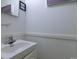 Bathroom with sink, vanity, and decorative mirror at 5623 Eastbrook Rd, Charlotte, NC 28215