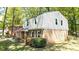 Charming two-story brick home with mature landscaping at 5623 Eastbrook Rd, Charlotte, NC 28215