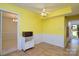 Bright eat-in kitchen features wainscoting, tile floor, and neutral countertops at 5623 Eastbrook Rd, Charlotte, NC 28215