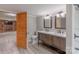 Bathroom featuring double vanity, modern fixtures, and plenty of space at 589 Lippard Farm Rd, Statesville, NC 28625