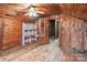 Wooden attic room with closet, built-in shelves and fan at 589 Lippard Farm Rd, Statesville, NC 28625