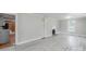 Cozy living room with gray walls, light wood floors, and a decorative fireplace at 589 Lippard Farm Rd, Statesville, NC 28625