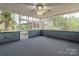 Sunroom with windows all around at 589 Lippard Farm Rd, Statesville, NC 28625