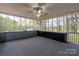 Sunroom with windows all around and built in cabinets at 589 Lippard Farm Rd, Statesville, NC 28625