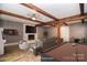 The finished basement is virtually staged with a pool table, fireplace and dart board at 6008 Corkstone Dr, Mint Hill, NC 28227