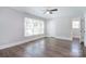 Bright bedroom featuring ample natural light and wood-look flooring at 6008 Corkstone Dr, Mint Hill, NC 28227