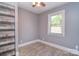 Bedroom with wood-look flooring, standard closet, and a window bringing in natural light at 6008 Corkstone Dr, Mint Hill, NC 28227