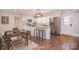 Kitchen features white cabinets, stainless steel appliances, and granite countertops at 6008 Corkstone Dr, Mint Hill, NC 28227