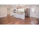 Modern kitchen with stainless steel appliances, granite countertops, and a center island at 6008 Corkstone Dr, Mint Hill, NC 28227
