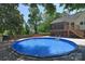 Sparkling pool surrounded by a spacious deck area, perfect for relaxing and enjoying the outdoors at 6008 Corkstone Dr, Mint Hill, NC 28227