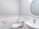 Neat powder room with wainscoting and vessel sink at 6008 Corkstone Dr, Mint Hill, NC 28227