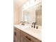 Modern bathroom vanity with double sinks, matte black faucets, and large mirror reflects shower at 606 W 19Th Ave, Gastonia, NC 28052
