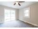 Bedroom featuring neutral walls, a sliding glass door and one window at 606 W 19Th Ave, Gastonia, NC 28052