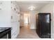 Kitchen with updated appliances, bright cabinets, and laminate floors throughout at 606 W 19Th Ave, Gastonia, NC 28052