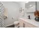 Clean bathroom features black and white accents, a modern vanity, and stylish fixtures at 7230 Ridge Lane Rd, Charlotte, NC 28262