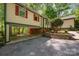 Home featuring an open carport and well-maintained landscaping at 7230 Ridge Lane Rd, Charlotte, NC 28262