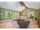 Cozy living room with ample natural light, comfortable sofas, and hardwood floors at 7230 Ridge Lane Rd, Charlotte, NC 28262